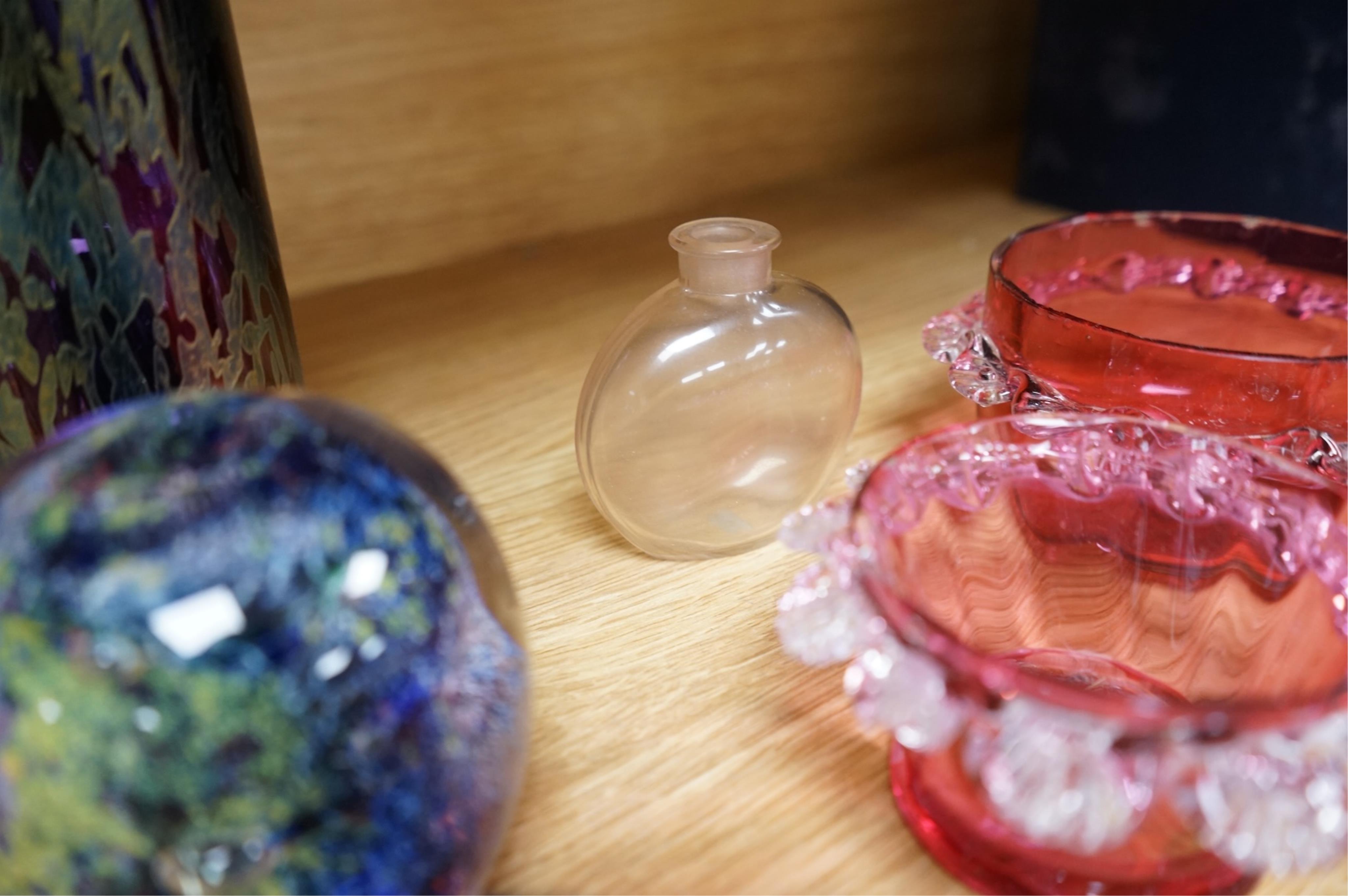A collection of scent bottles, cranberry glass salts, three glass paperweights and a vase. tallest 18cm high